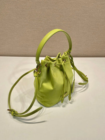 BUCKET BAG 19 IN APPLE GREEN RE-NYLON AND SAFFIANO LEATHER HANDLE