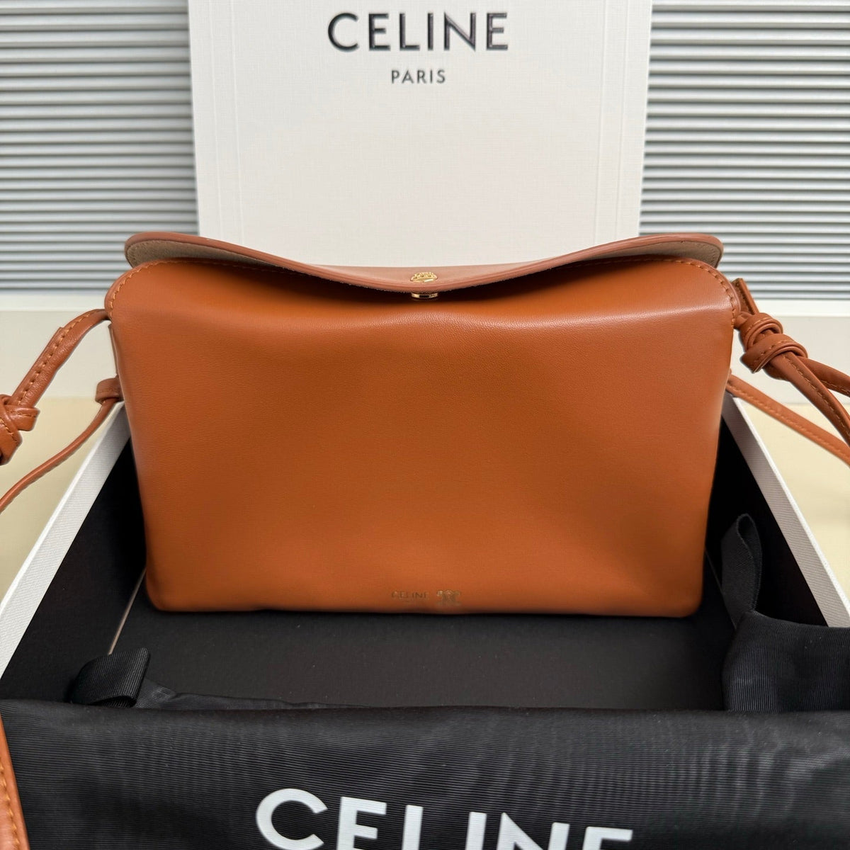 CELINE 25S TRIO FLAP 22MM IN BURNT ORANGE SMOOTH LAMBSKIN GOLD HARDWARE
