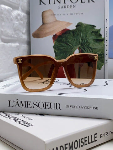TRIOMPHE SUNGLASSES 552774 IN CARAMEL ACETATE TEXT LOGO