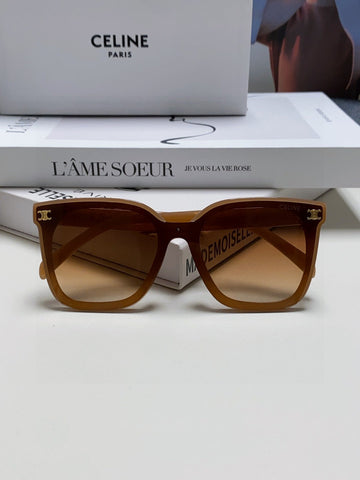 TRIOMPHE SUNGLASSES 552774 IN CARAMEL ACETATE TEXT LOGO