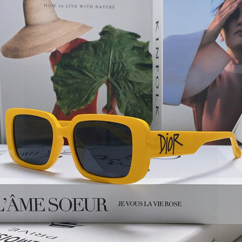 MONTAIGNE SUNGLASS 571593 IN YELLOW ACETATE TEXT LOGO